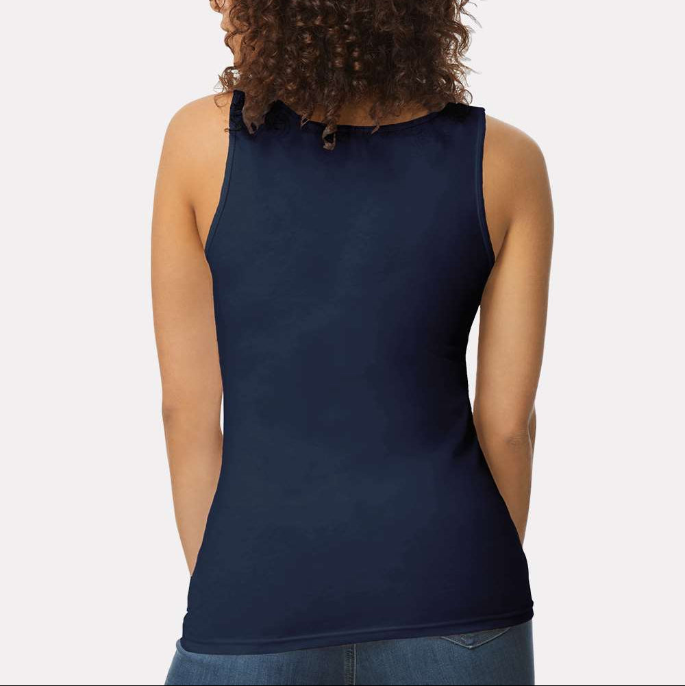 Person wearing a navy blue tank top on a plain background